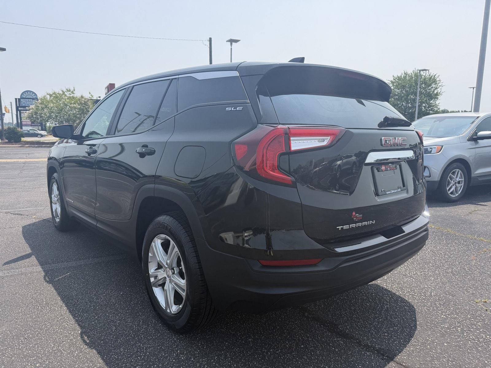 Used 2024 Ebony Twilight Metallic GMC SLE image 5