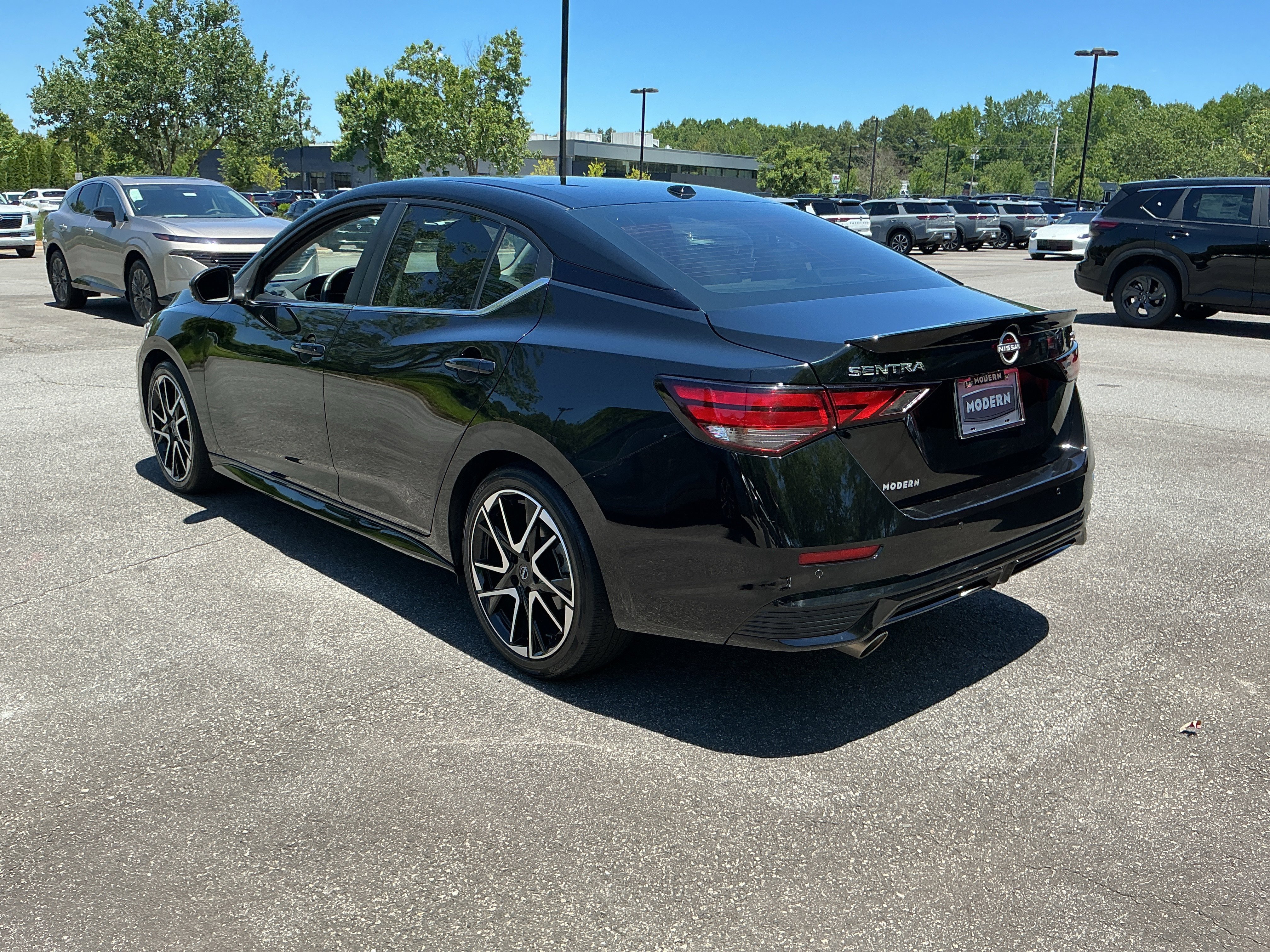 Used 2024 Super Black Nissan SR image 2