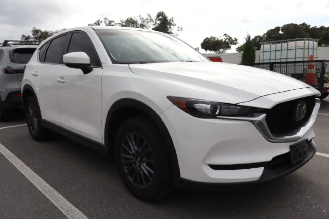 Used 2019 Snowflake White Pearl Mazda Touring image 1