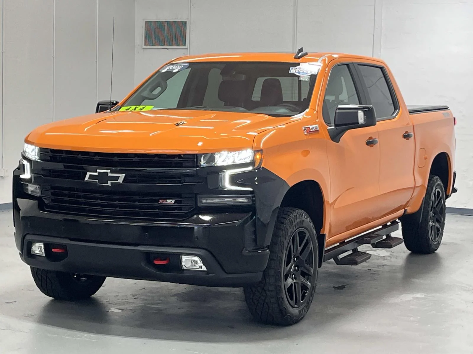 Used 2022 All normally body colored non-sheet metal parts will be black including front fender extensions, cab spoiler on Double & Crew cabs and LT trim door handles. May require extended lead time. Chevrolet LT Trail Boss image 4