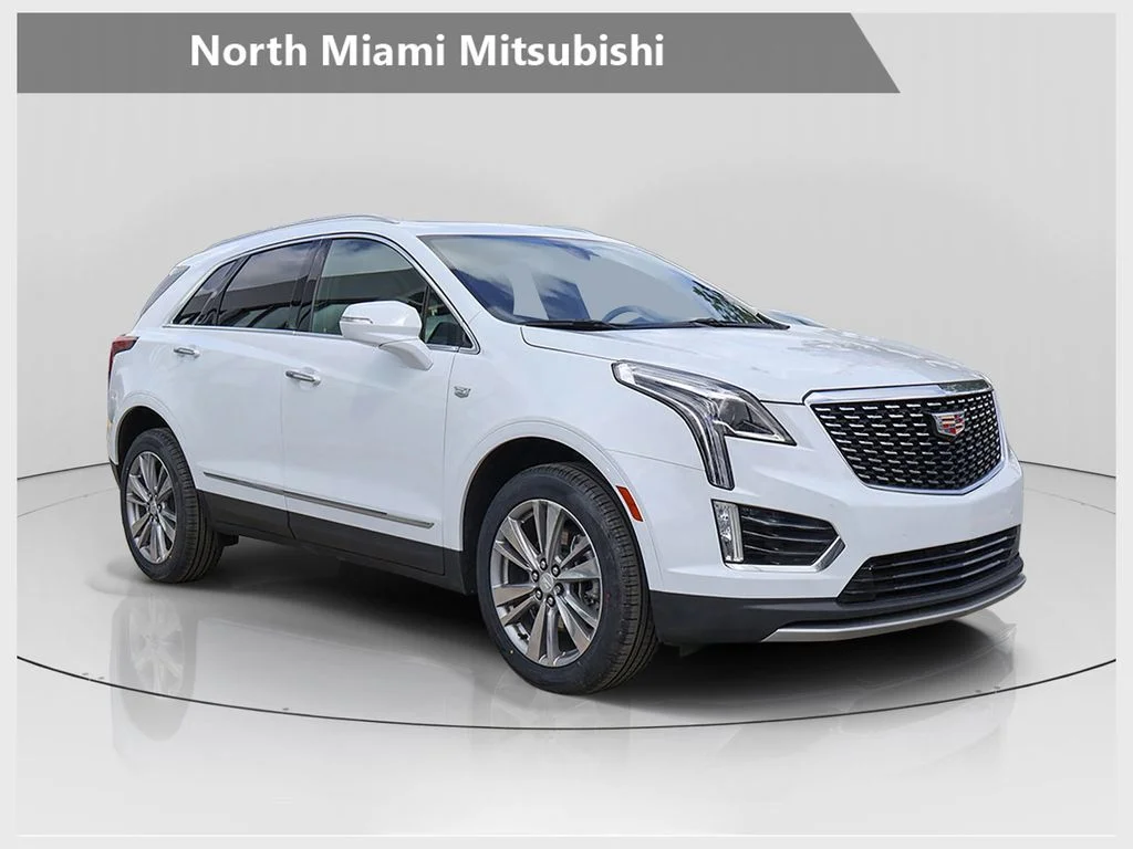 Used 2024 White Cadillac Premium Luxury image 1