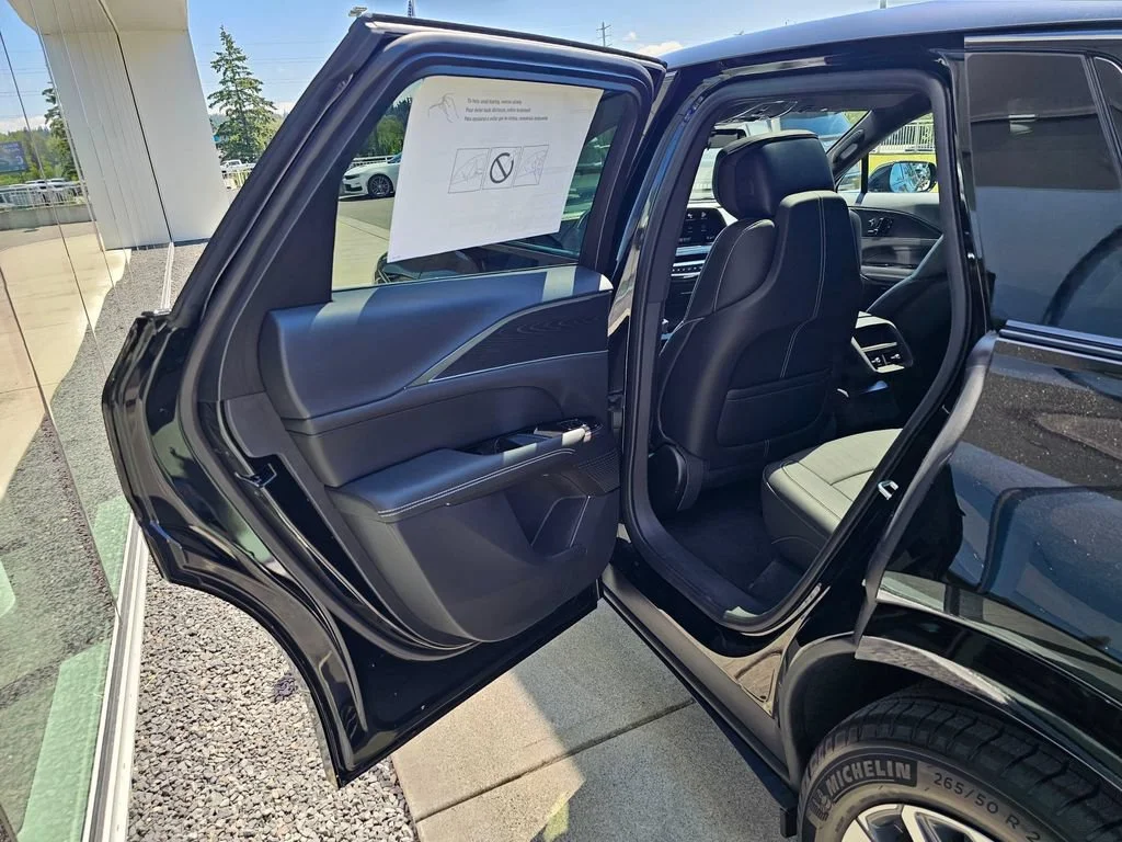New 2026 Stellar Black Metallic Cadillac Sport image 15