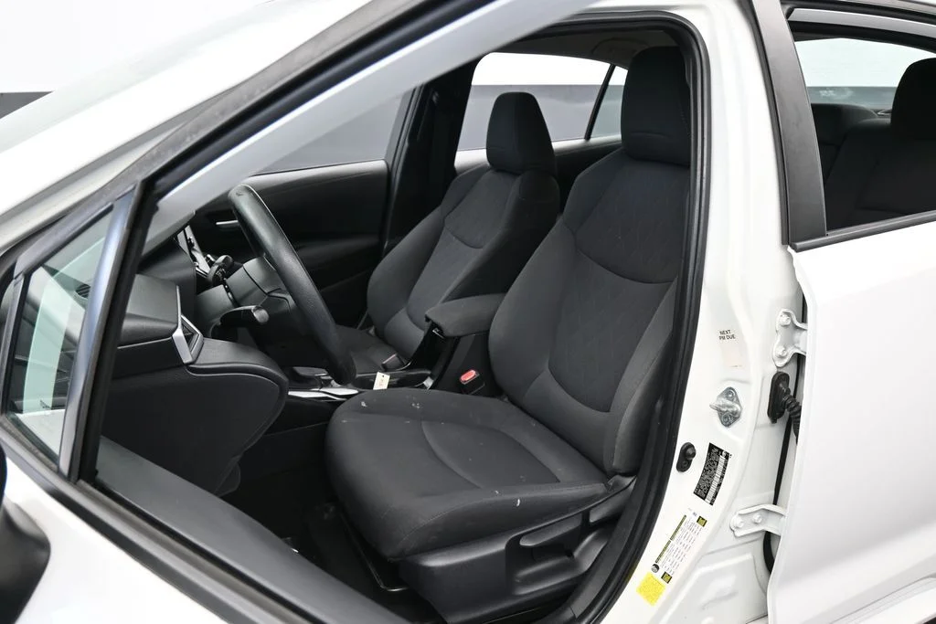 Used 2021 Super White Toyota LE image 9