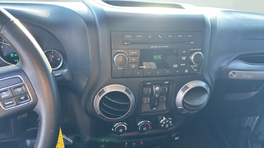 Used 2013 Silver Jeep Unlimited Sport image 17