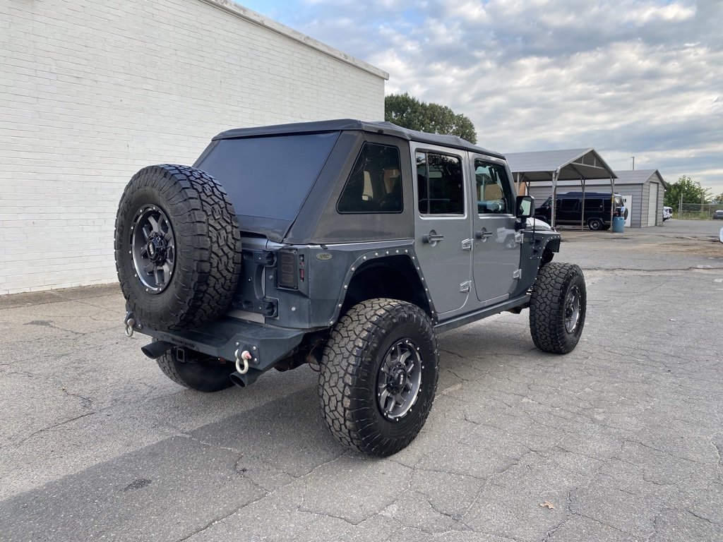 Used 2013 Jeep Wrangler Unlimited Rubicon with VIN 1C4BJWFGXDL641562 for sale in Madison, NC