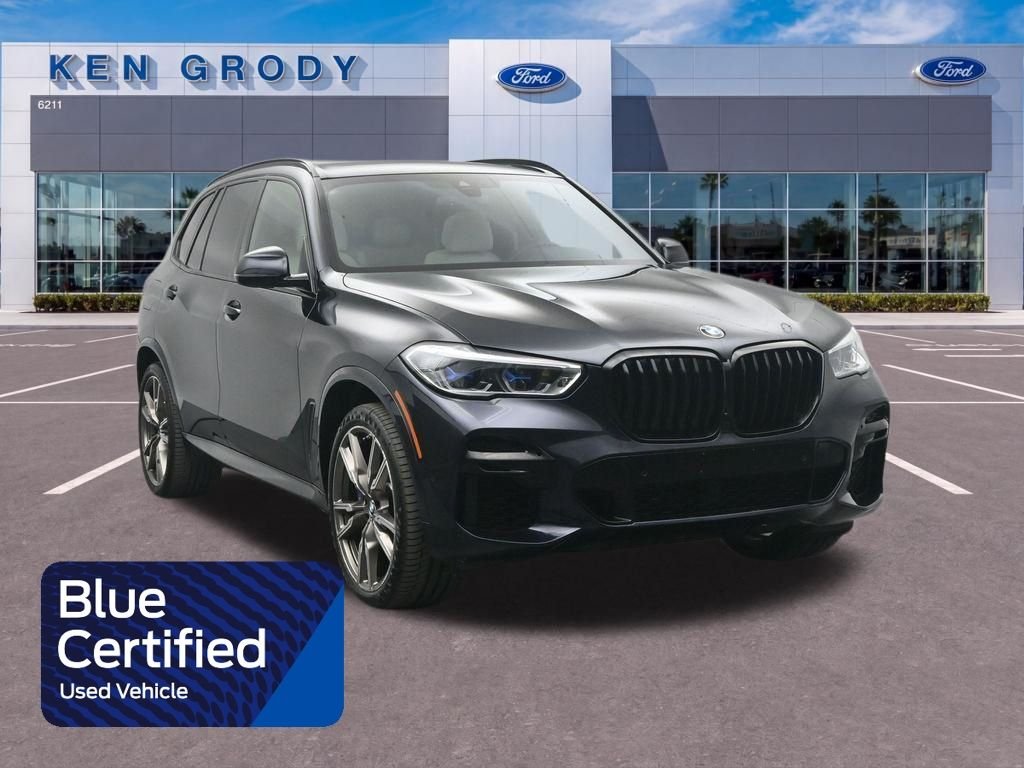 Used 2022 Black BMW M50i image 1