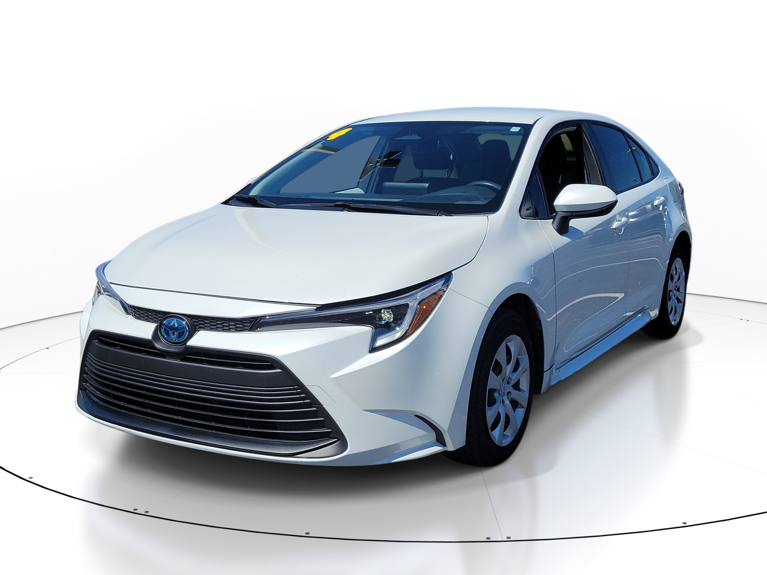 Used 2024 Pearl Toyota LE image 2