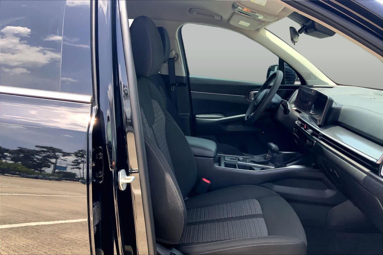 Used 2024 Ebony Black Kia LX image 9