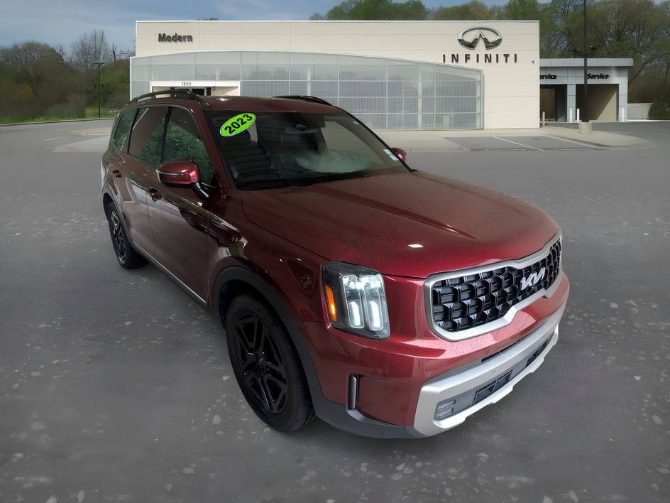Used 2023 Dawning Red Kia SX X-Line image 1