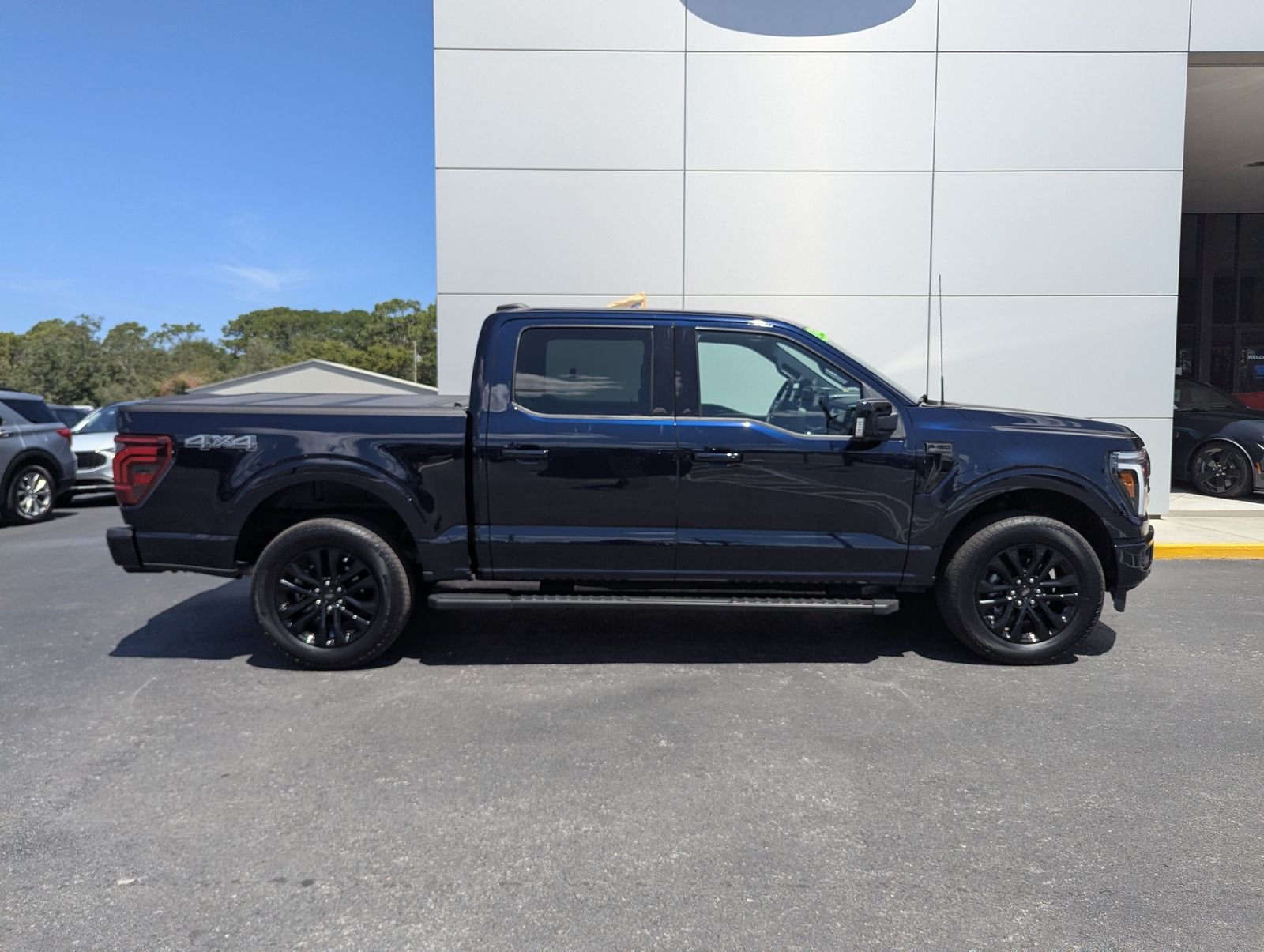 Certified Used 2025 Blue Metallic Ford Lariat image 3