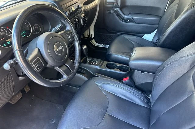 Used 2016 White Jeep Unlimited Sport image 10