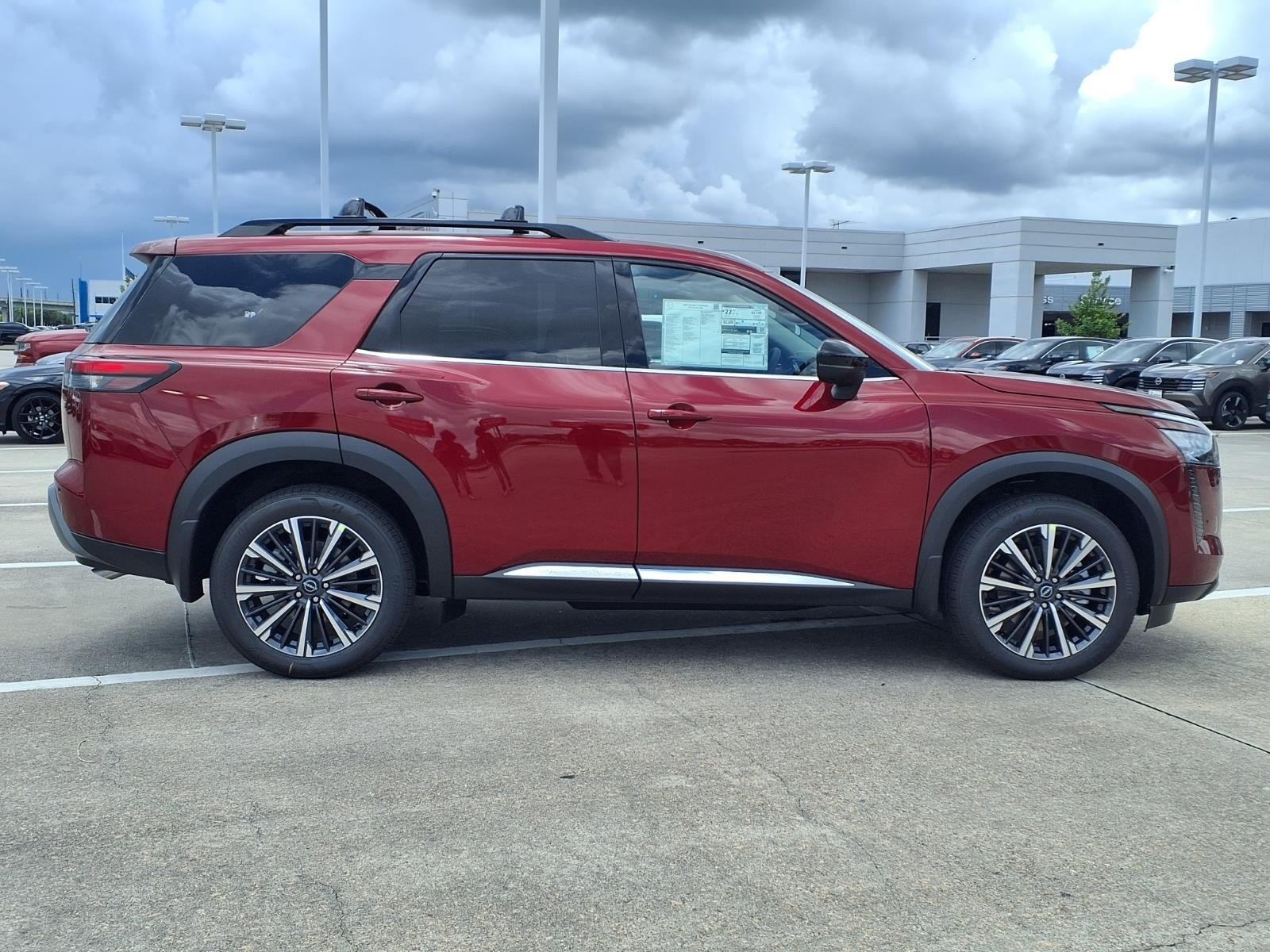 2026 Nissan Pathfinder Platinum Red at Robbins Nissan