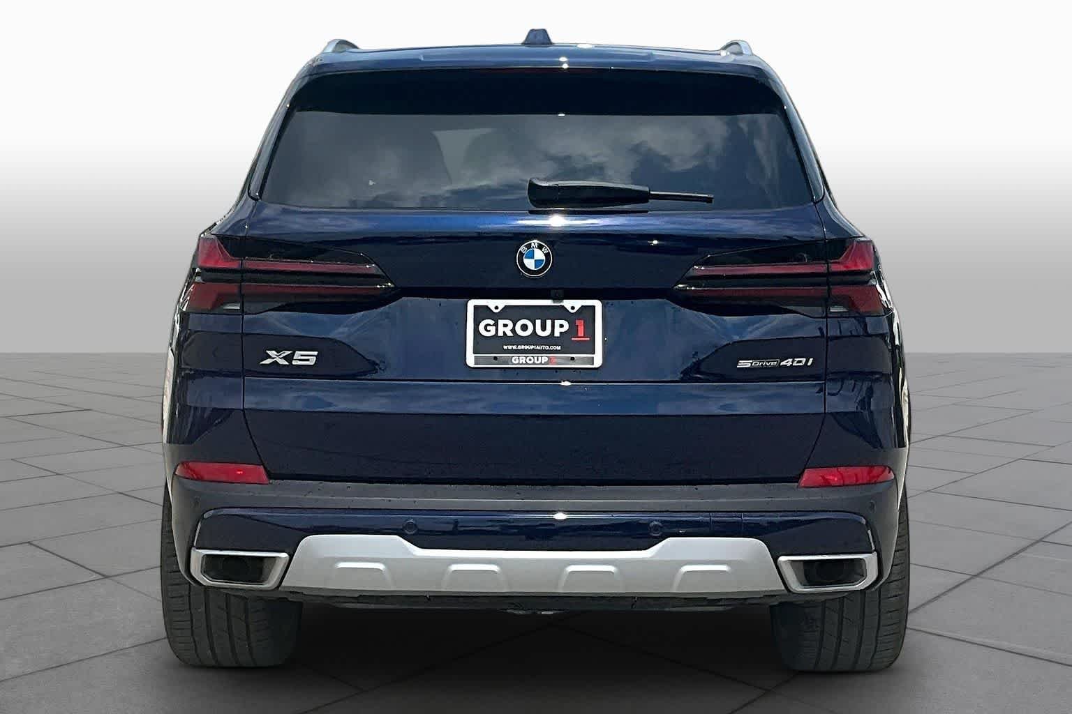 Used 2026 Tanzanite Blue II Metallic BMW sDrive40i image 4
