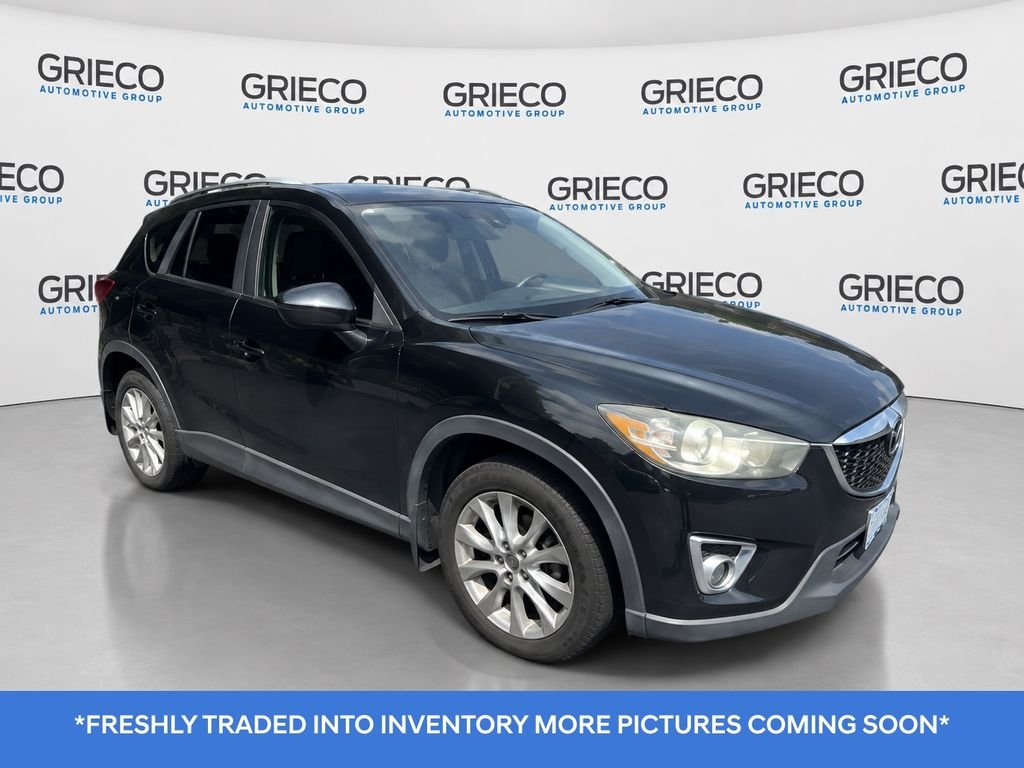 Used 2014 Black Mazda Grand Touring image 1