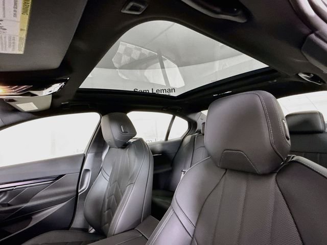 New 2027 Carbon Black Metallic BMW 550e xDrive image 23