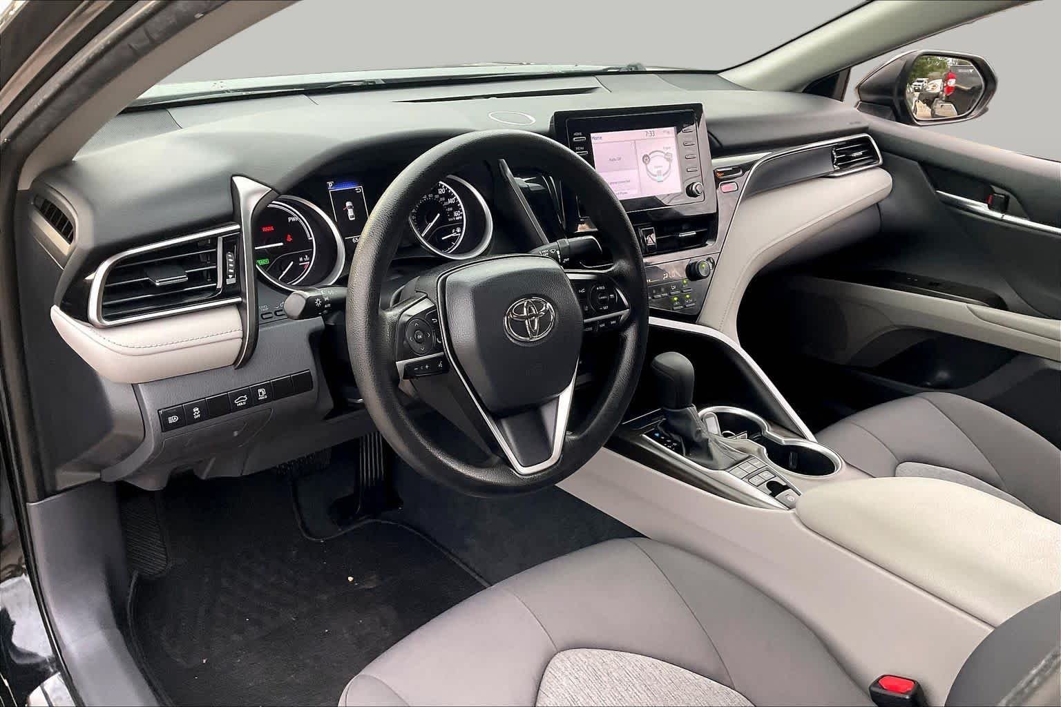 Used 2022 Midnight Black Metallic Toyota Hybrid LE image 16