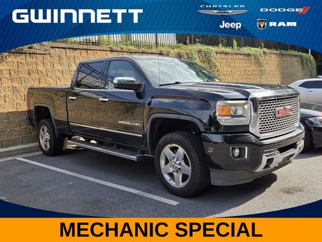Used 2015 Black GMC Denali image 1