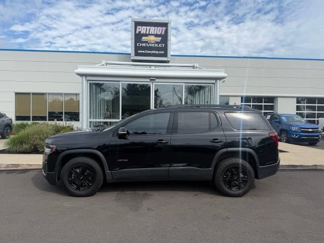 Used 2023 EBONY TWILIGHT METALLIC GMC AT4 image 1