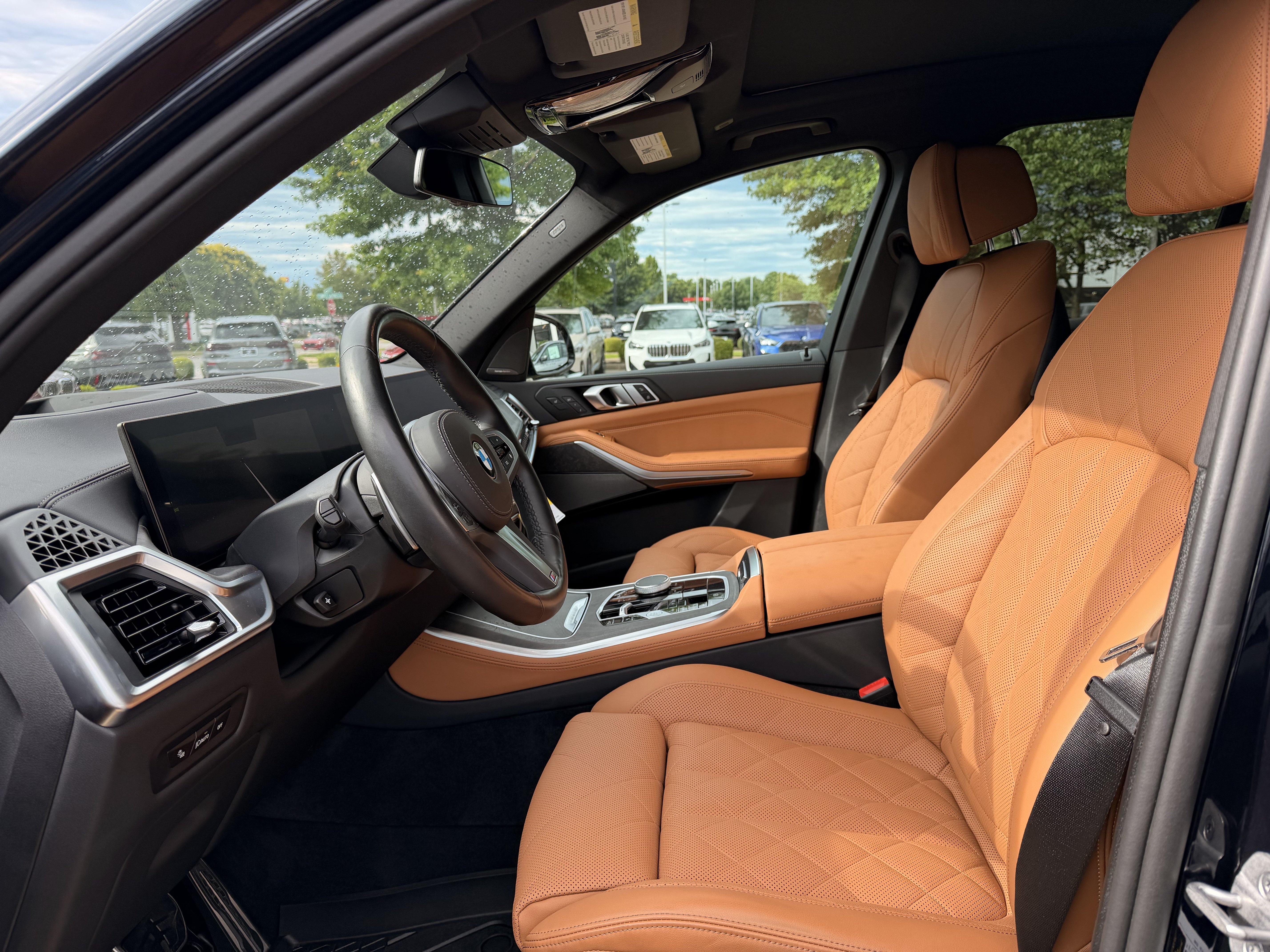 Certified Used 2025 Carbon Black Metallic BMW xDrive40i image 2