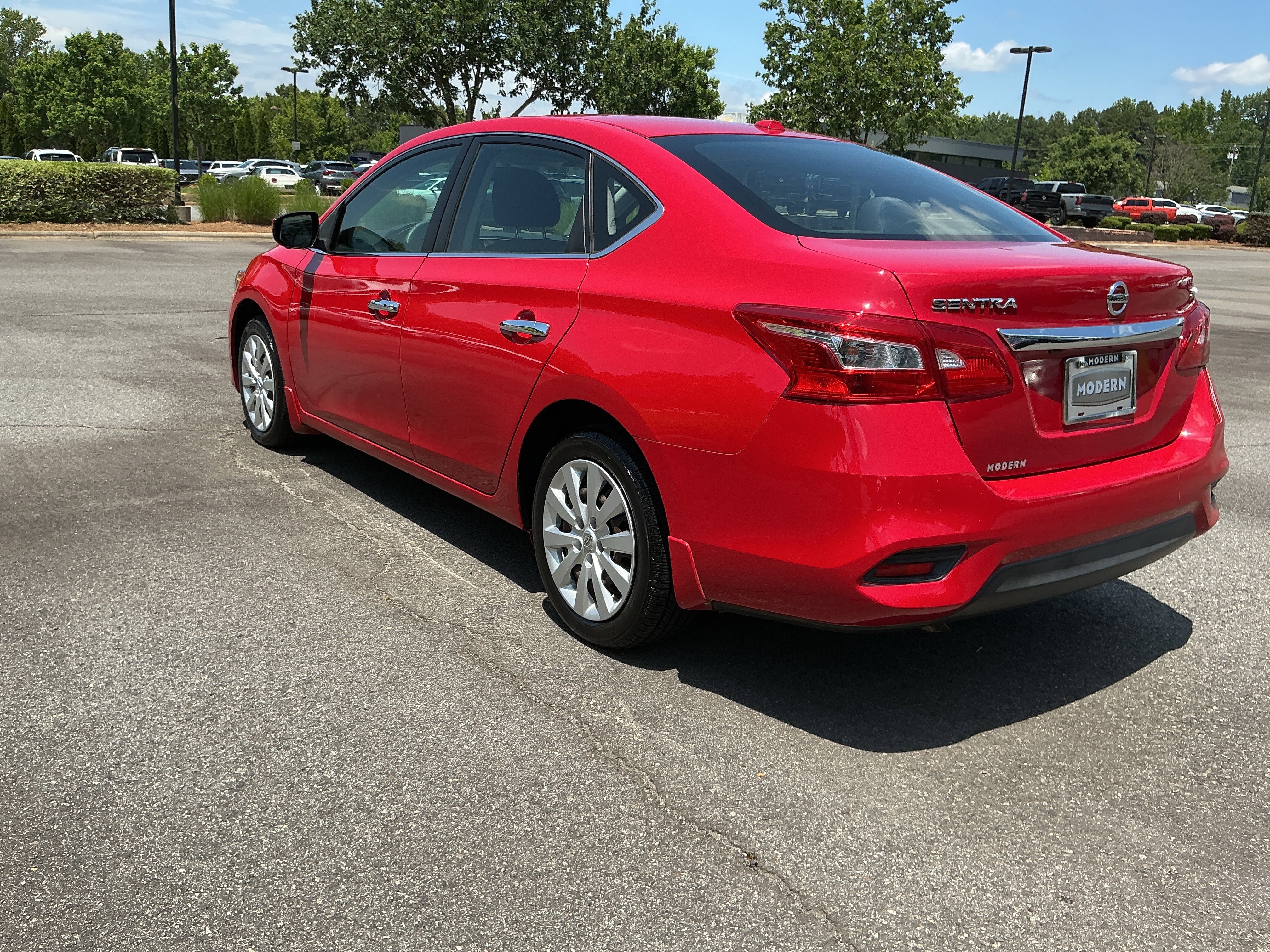 Used 2017 Red Alert Nissan SV image 2