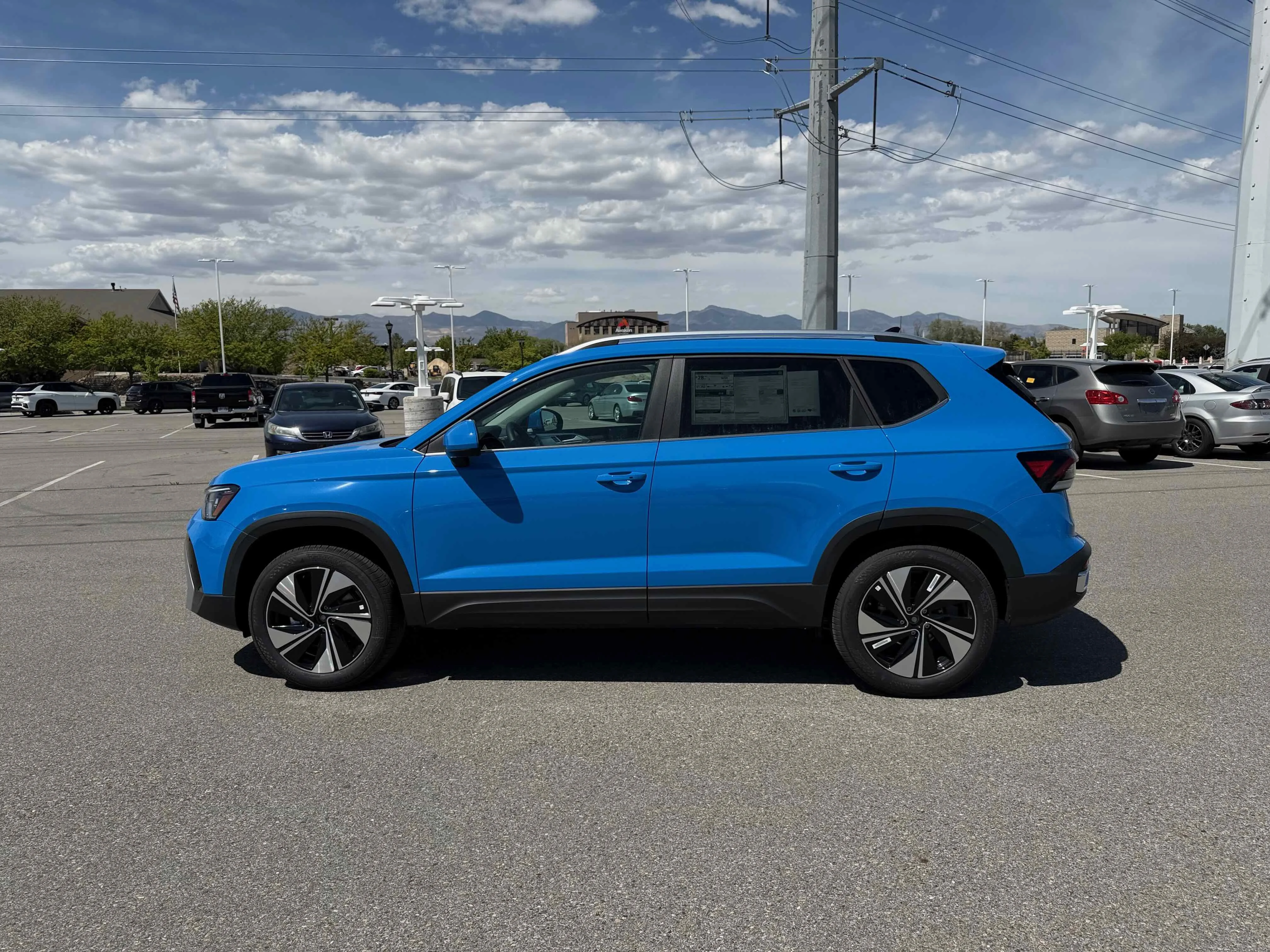 New 2026 Blue Volkswagen SE image 2
