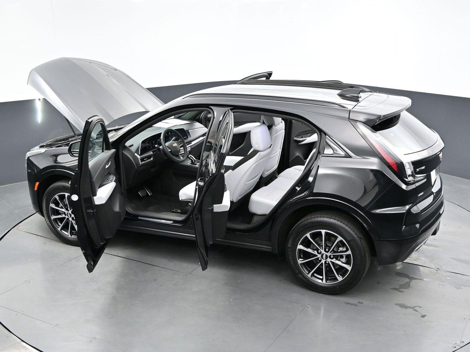 Used 2024 Stellar Black Metallic Cadillac Sport image 39