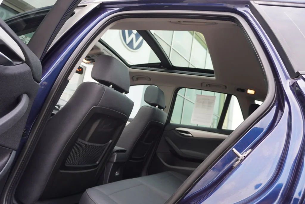 Used 2014 BMW X1 28i with VIN WBAVL1C57EVR93319 for sale in Highland, IN