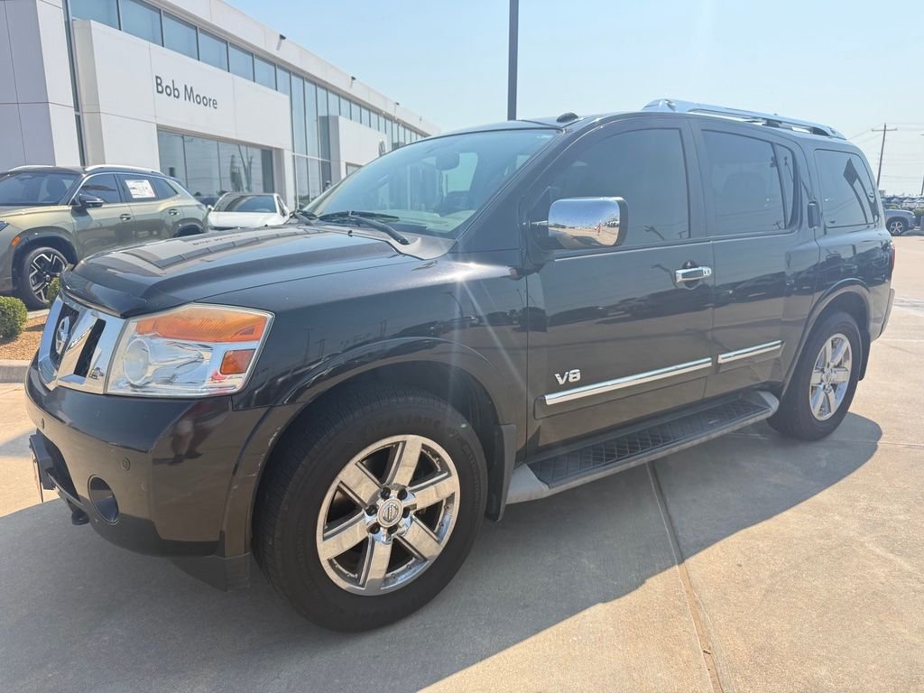 Used 2012 Espresso Black Metallic Nissan Platinum image 1