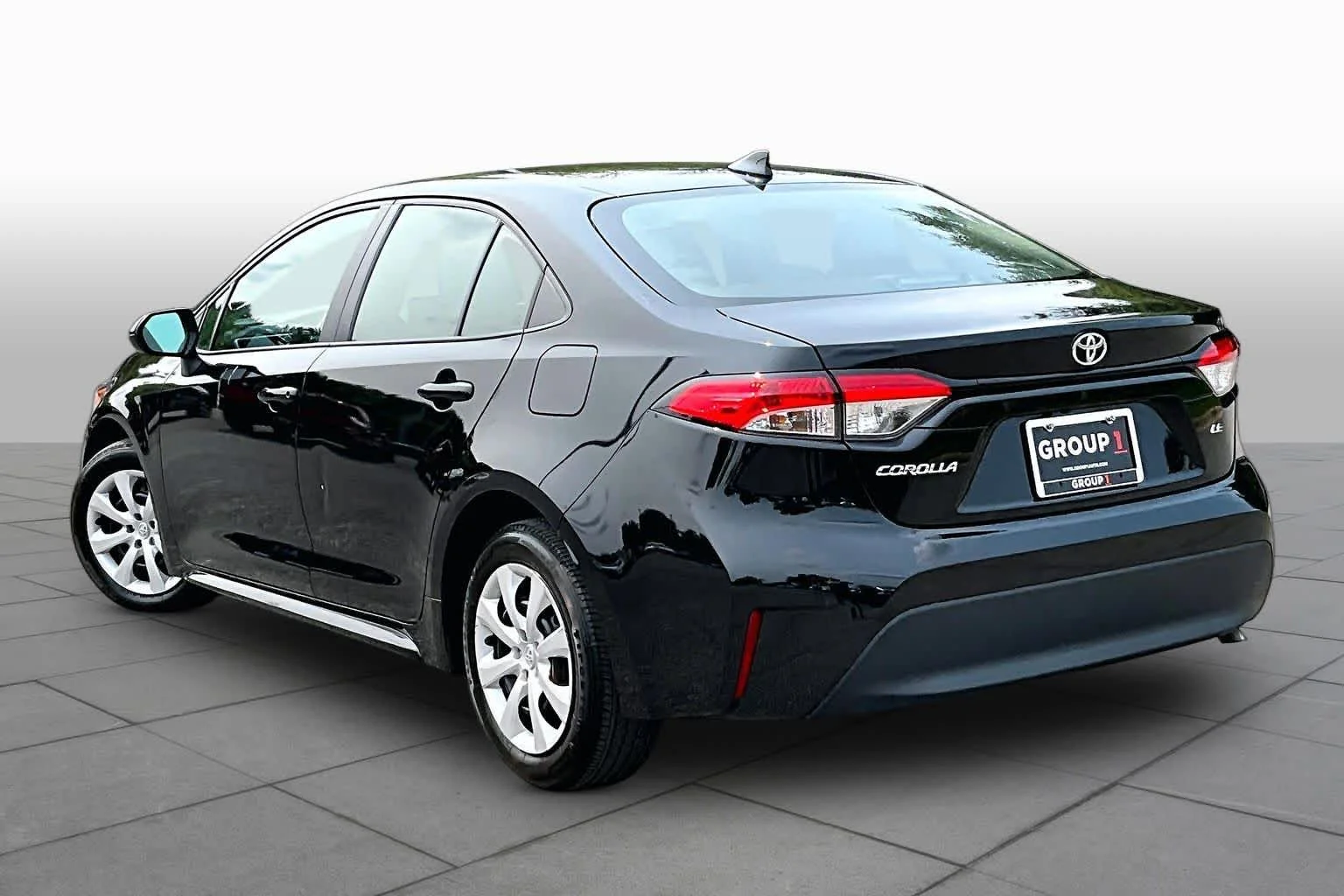 Used 2024 Midnight Black Metallic Toyota LE image 12
