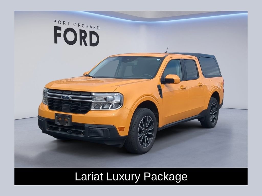 Used 2022 Orange Ford Lariat image 1