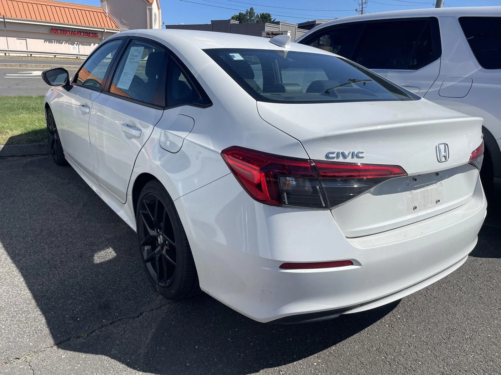 Used 2024 Platinum White Pearl Honda Sport image 4