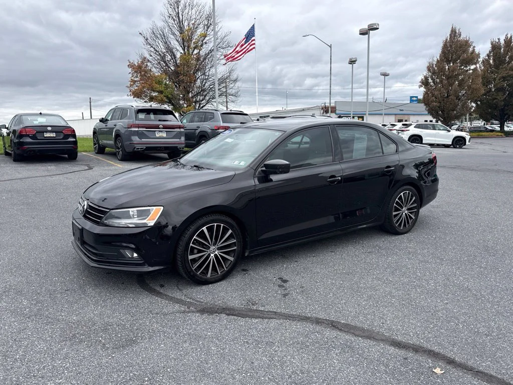 Used 2016 Black Uni Volkswagen 1.8T Sport image 7