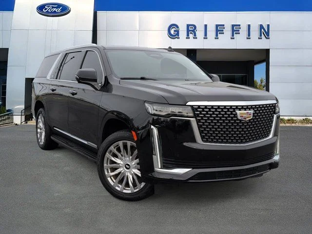 Used 2021 Black Cadillac Premium image 1