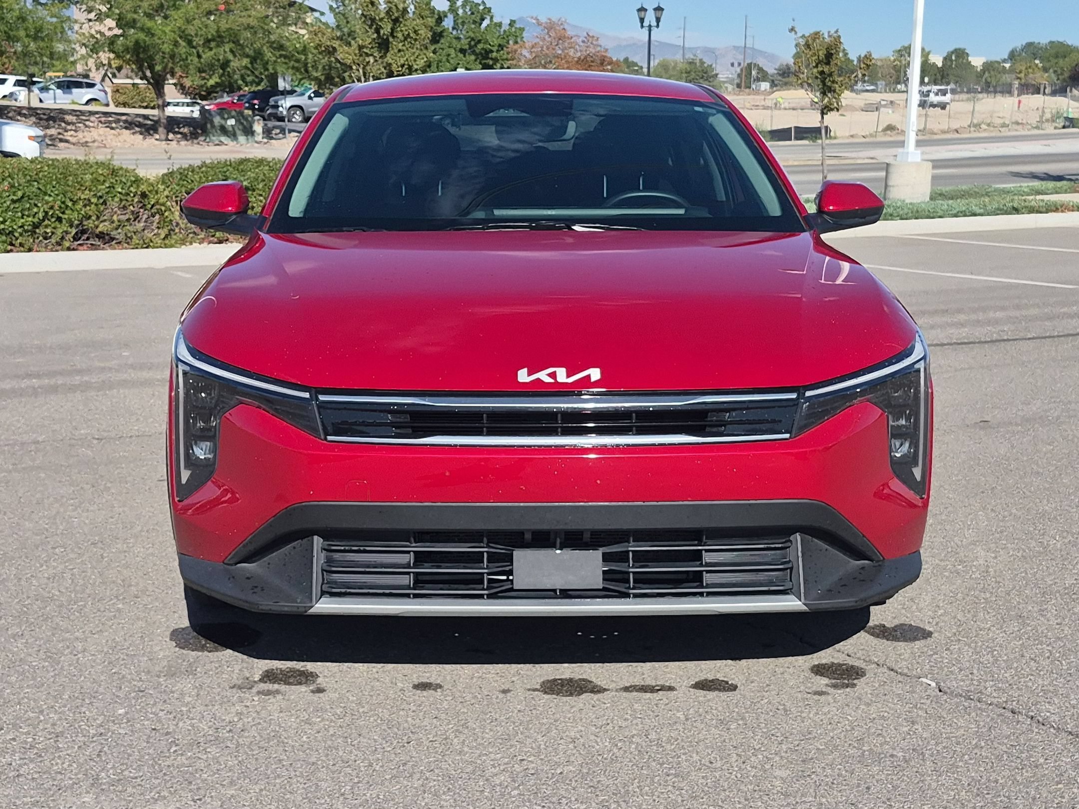 Used 2025 Currant Red Kia EX image 9