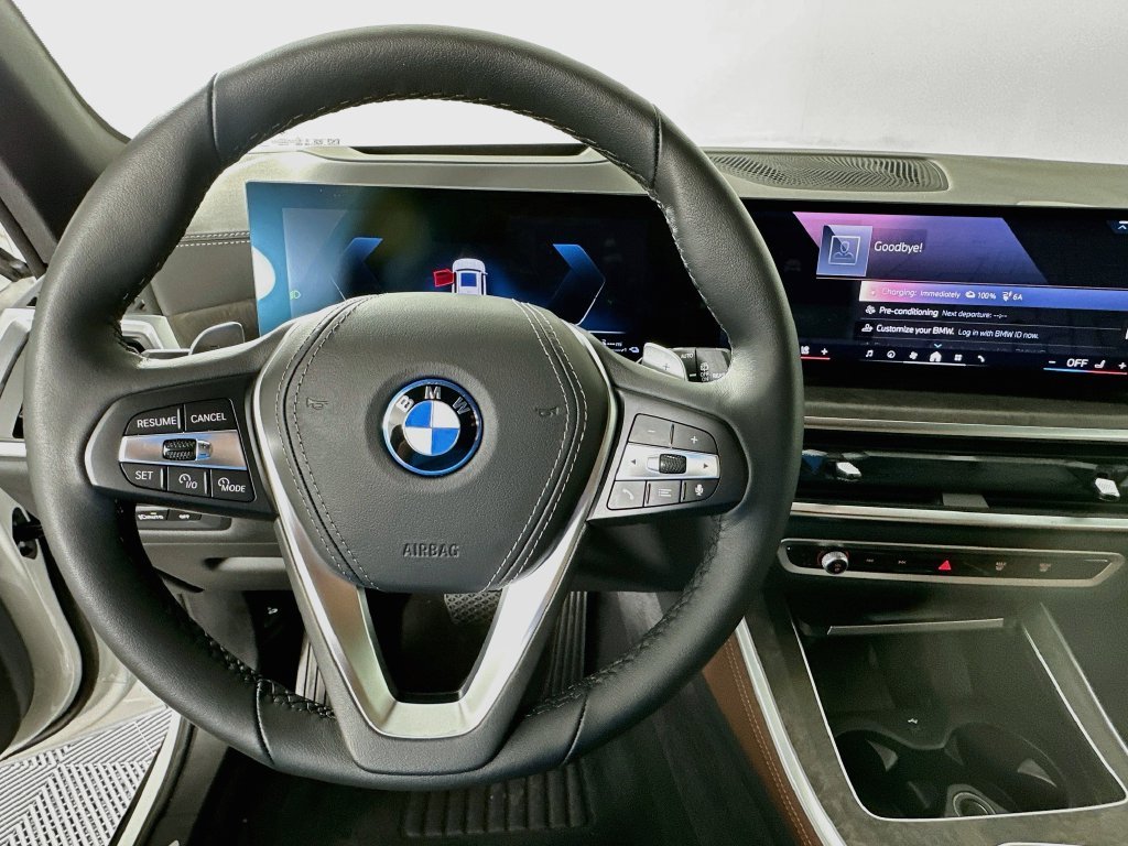 Used 2026 White Metallic BMW xDrive50e image 11