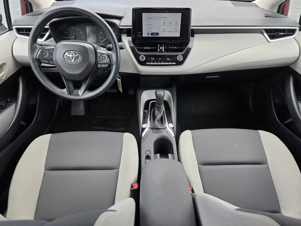 Used 2024 Red Med Toyota LE image 11