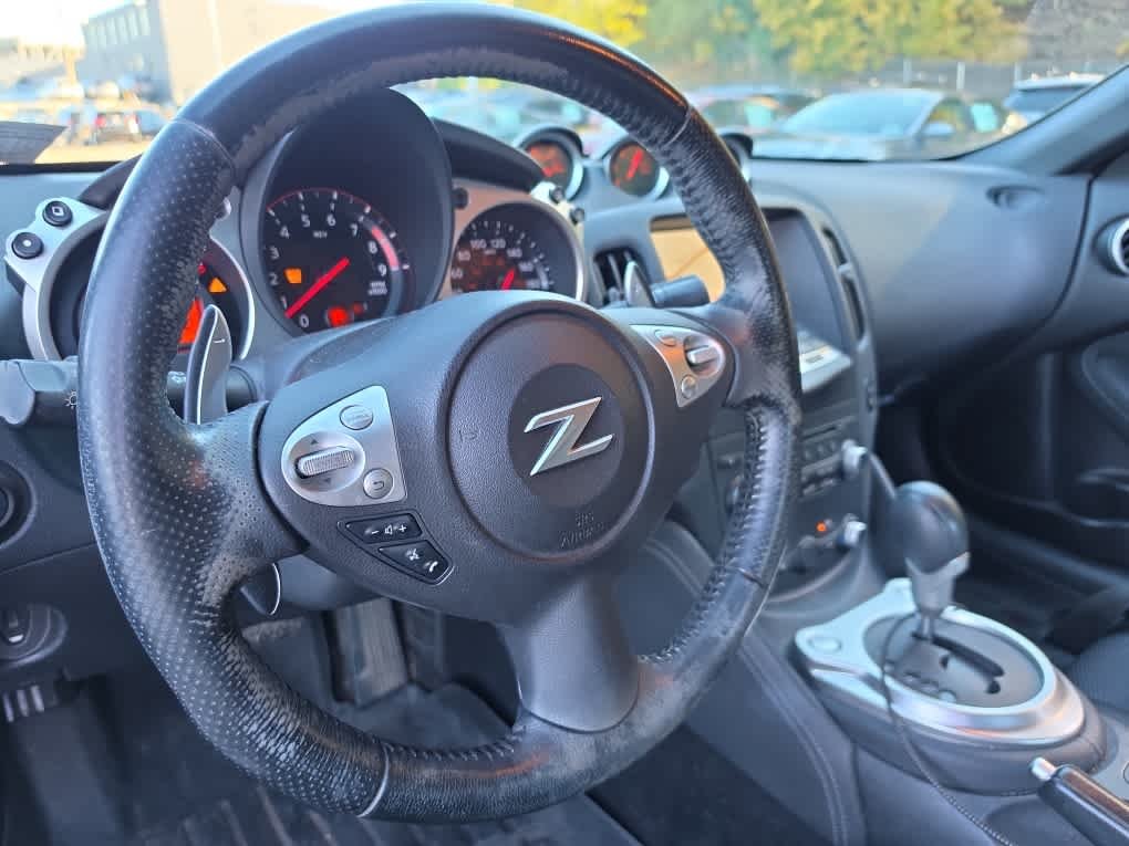 Used 2016 Magnetic Black Nissan Sport Tech image 17