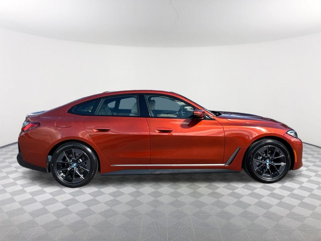 Certified Used 2023 Sunset Orange Metallic BMW eDrive35 image 3