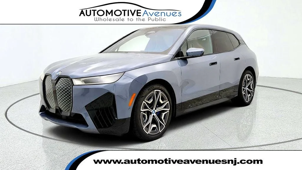 Used 2025 Storm Bay Metallic BMW xDrive50 SAV w/ Premium, Sport, Luxury Pkgs & Air Suspension image 1