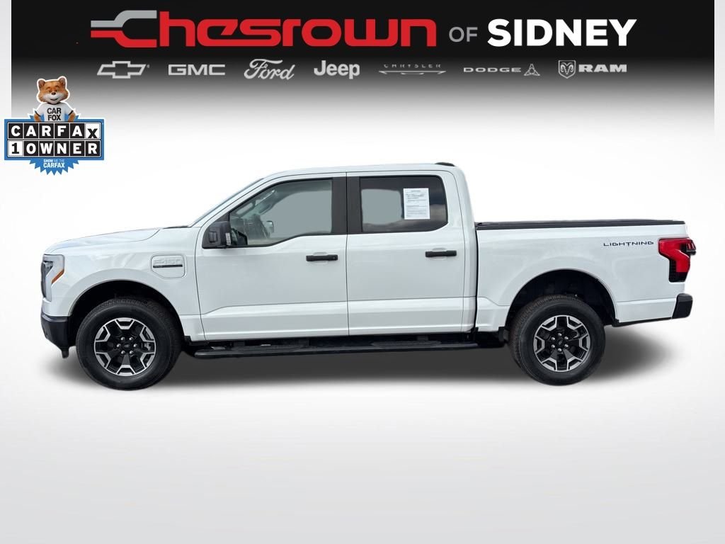 Used 2022 Ford F-150 Lightning Pro with VIN 1FTVW1EL7NWG02587 for sale in Sidney, OH