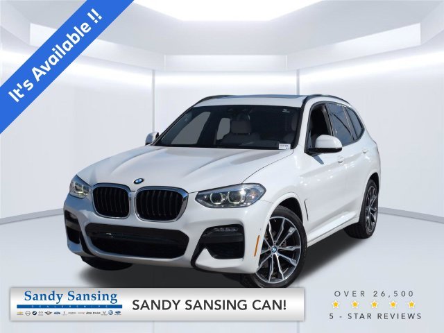Used 2021 White BMW sDrive30i image 1