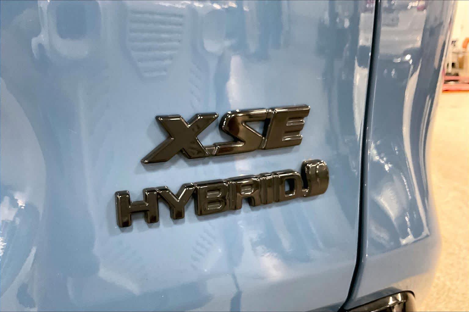 Used 2023 Cavalry Blue/Midnight Black Metallic Toyota Hybrid XSE image 10