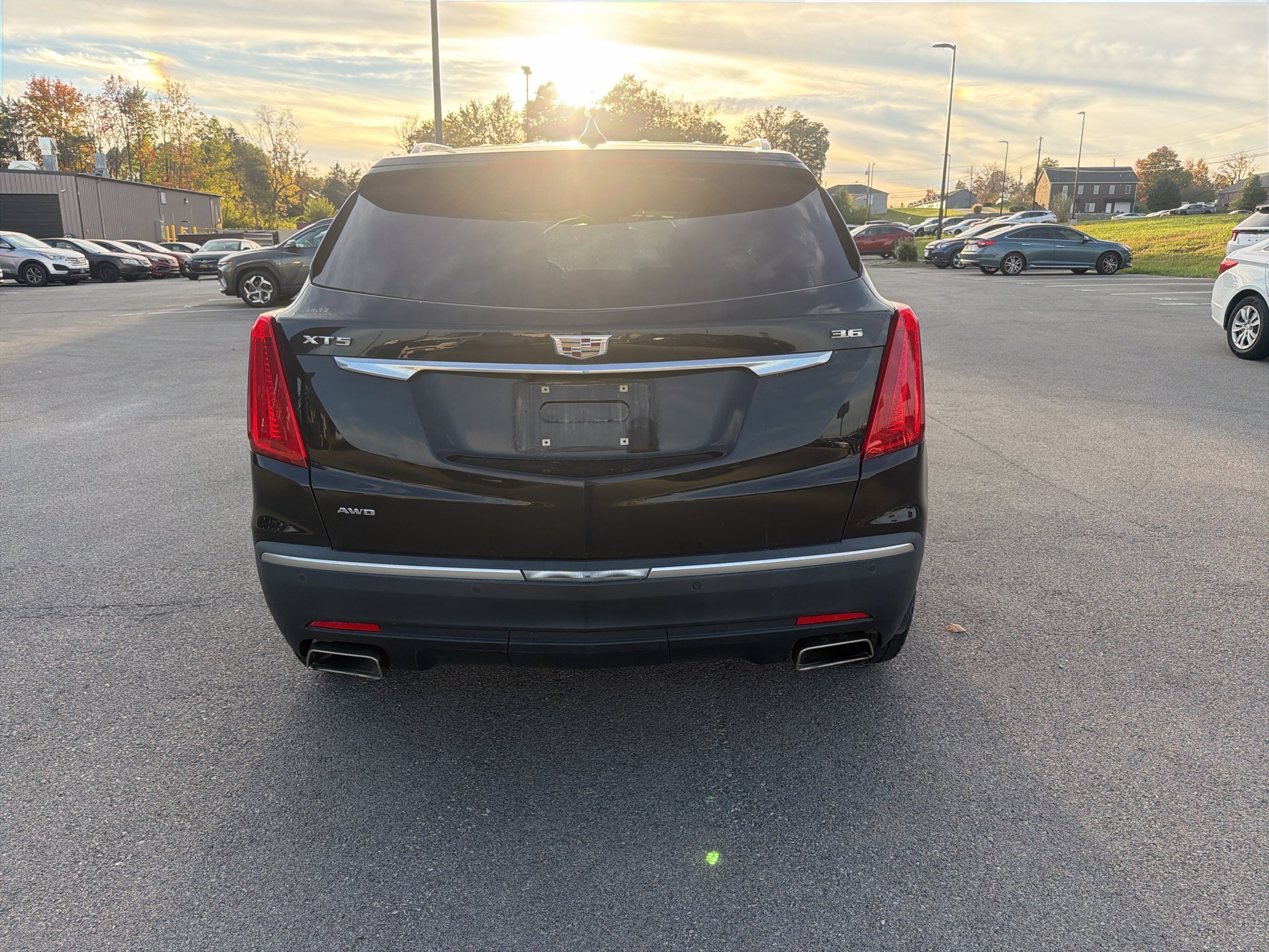 Used 2017 Stellar Black Metallic Cadillac Luxury AWD image 4