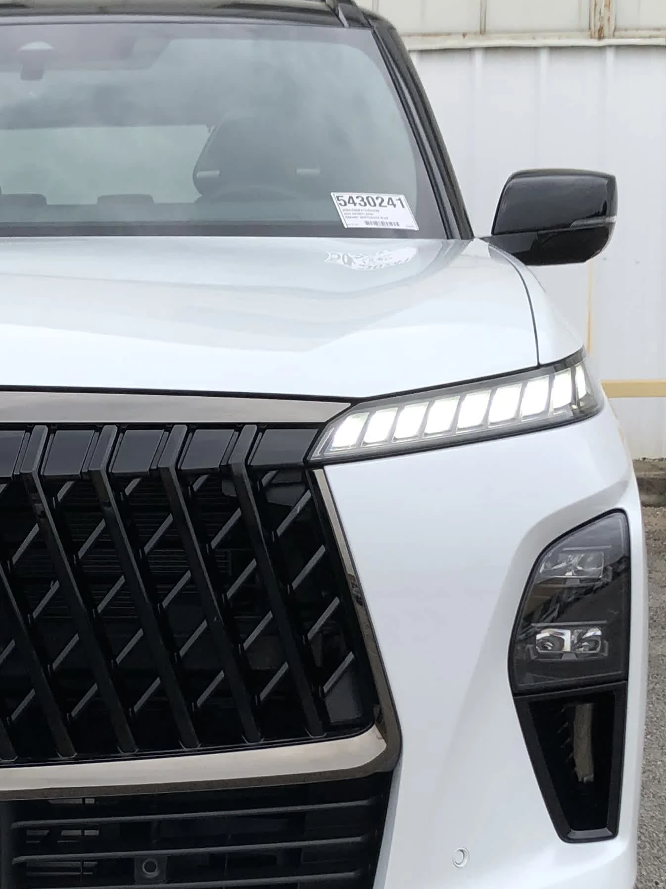 New 2026 RADIANT WHITE INFINITI Sport 4WD image 9