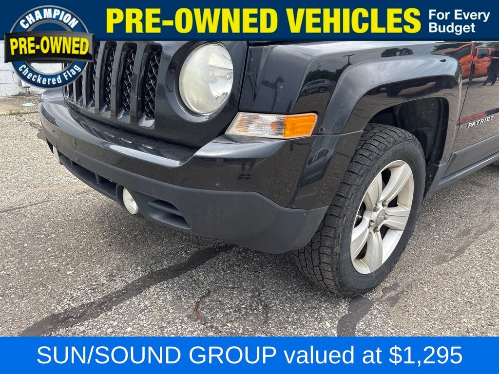 Used 2012 Black Jeep Latitude image 1