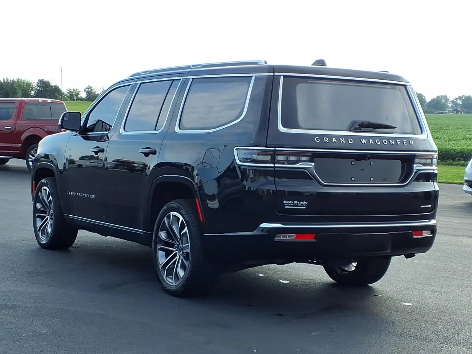 Used 2023 Diamond Black Crystal Pearl Coat Jeep Series III image 16