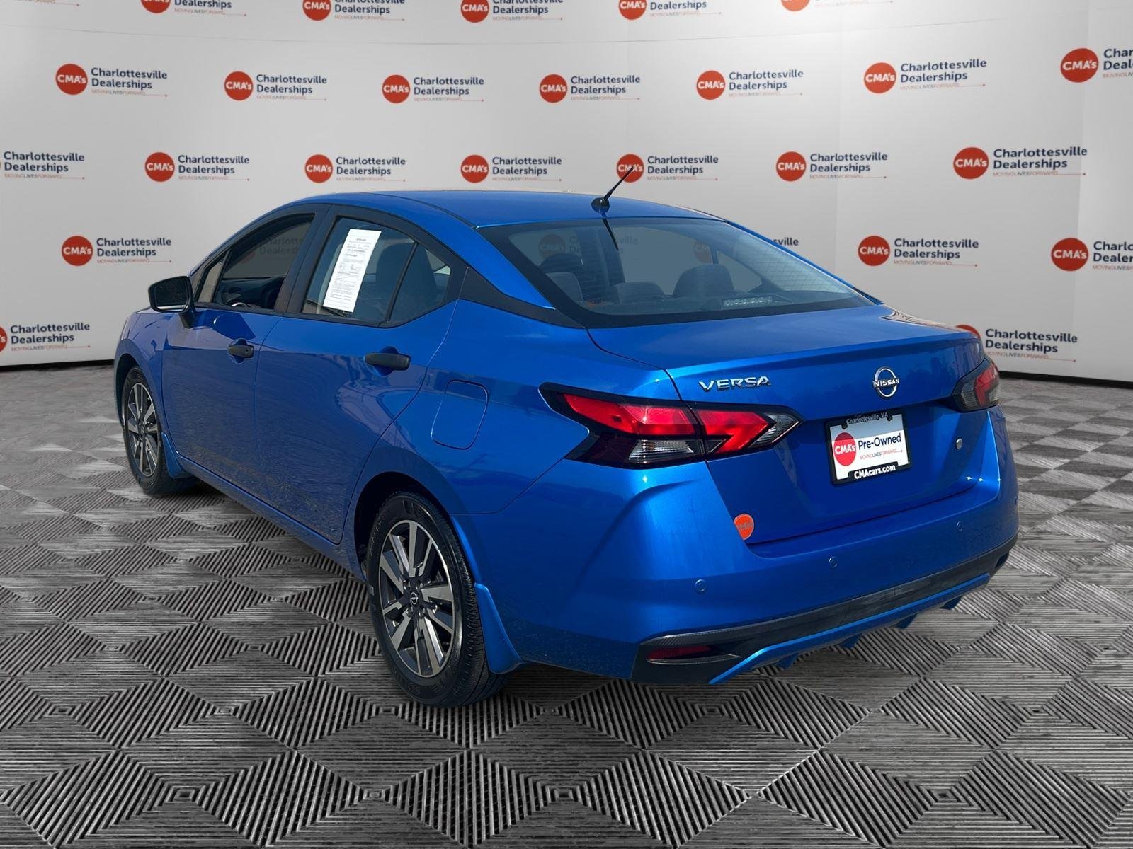 Used 2024 Electric Blue Metallic Nissan S image 3
