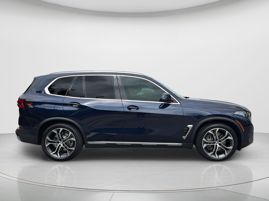 New 2026 Tanzanite Blue II Metallic BMW xDrive50e image 8