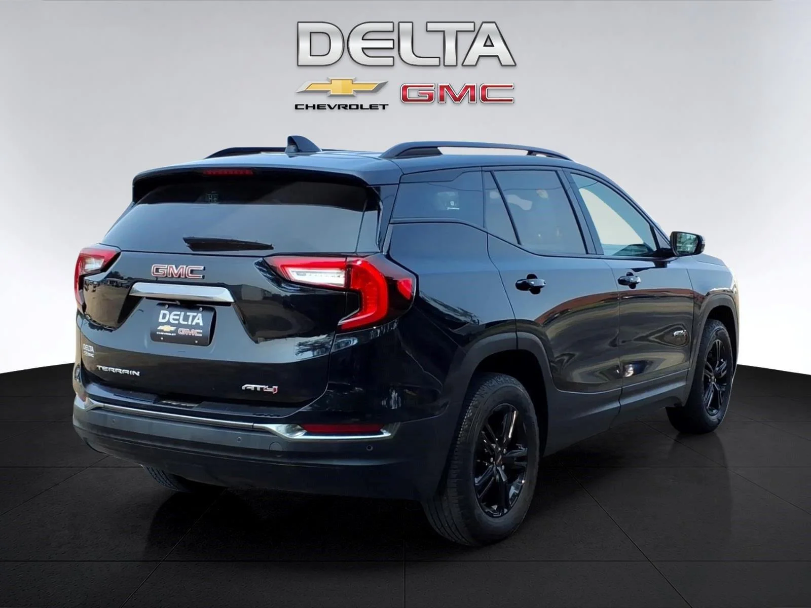 Used 2024 Ebony Twilight Metallic GMC AT4 image 5