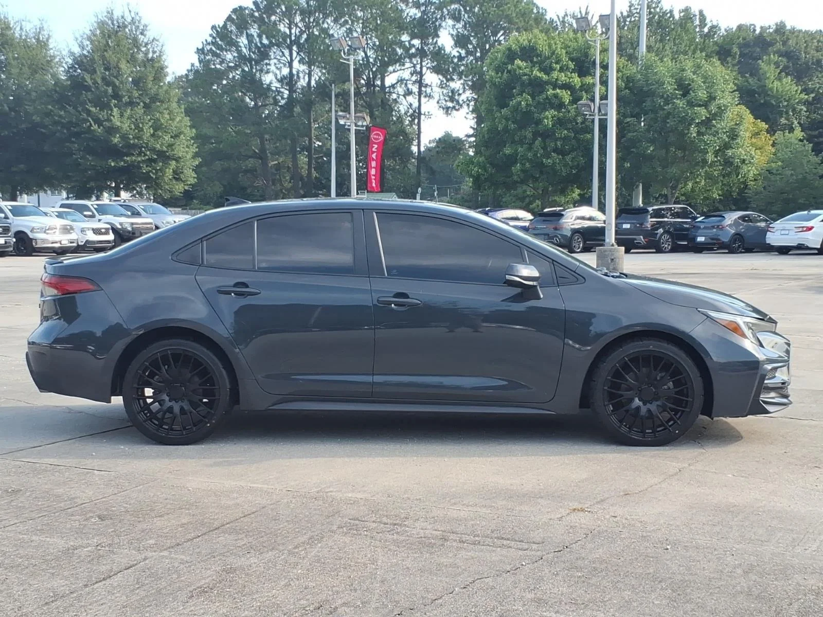 Used 2024 Underground/Midnight Black Metallic Toyota XSE image 6